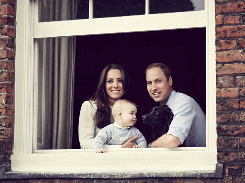 Britain's Prince William, Catherine, Duchess of Cambridge and their son Prince George, are seen in this photograph taken in Kensington Palace, in mid-March 2014, and received in London on March 29, 2014. The Prince and Duchess chose to release the family photograph ahead of their forthcoming tour to New Zealand and Australia. REUTERS
