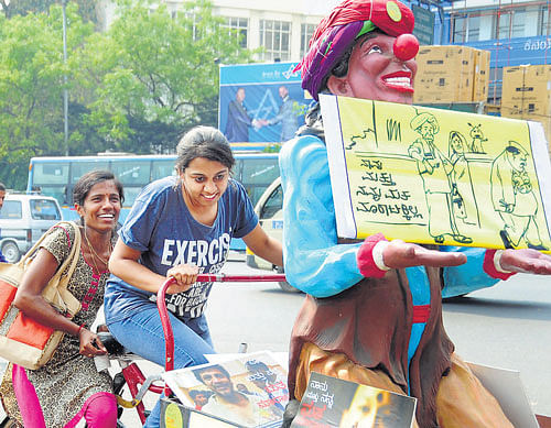 not for sale: Members of the Gram Panchayat Hakkottaya Andolana and the Concerned for Working Children campaign for fair elections, in Bangalore on Tuesday. dh photo