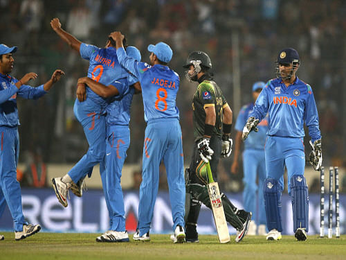 Riding on their superb unbeaten run in the World Twenty20 Championships so far, the Indian cricket team toppled Sri Lanka to clinch the top spot in the ICC rankings issued today. AP Photo