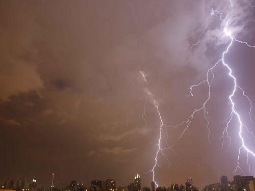 Scientists have developed a new technology that can send high-intensity laser beams through the atmosphere much farther than was possible before, and it could one day be used to guide lightning away from buildings, AP photo