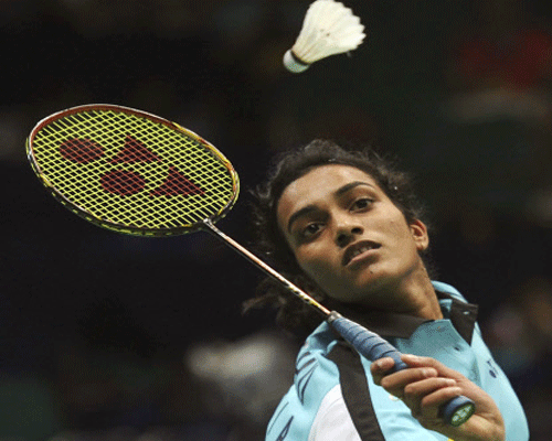 Indian favourite P.V. Sindhu was ousted by China's Shixian Wang in the women's singles first round of the India Open Super Series badminton here Wednesday, AP photo