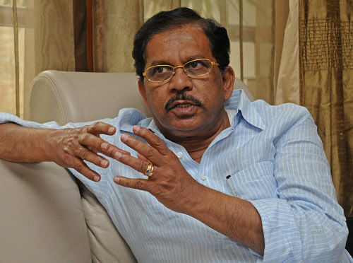 ''...no I didn't mean that. I just made that statement very casually... some sort of joke kind of a thing.. a cross reference, but I didn't mean that he (Gowda) should take poison and die...,'' says Parameshwara. DH file photo