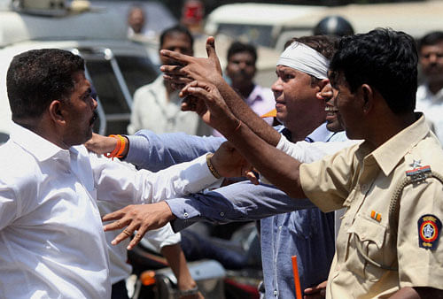 Shiv Sena and Maharashtra Navanirman Sena clash in Mumbai on Thursday. PTI Photo