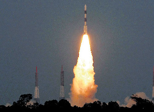 PSLVC24, carrying the country's navigational satellite IRNSS - 1B, takes off from Satish Dhawan Space Centre at Sriharikota in Andhra Pradesh on Friday. PTI