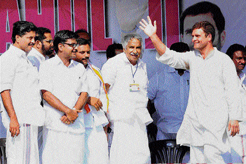Congress vice-president Rahul Gandhi at an election meeting at Kattapana in Idukki district on Saturday. Kerala Chief Minister Oommen Chandy is also seen.  PTI