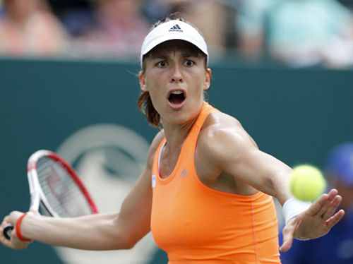 Bosnian-born German Andrea Petkovic outlasted rising Canadian star Eugenie Bouchard in a Family Circle Cup semifinal on Saturday to earn a spot in a WTA final for the eighth time. AP file photo
