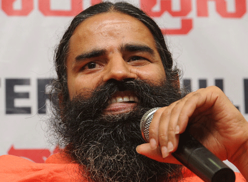 EC told not to allow 'Sri Sri' and Ramdev events before polls. DH Image