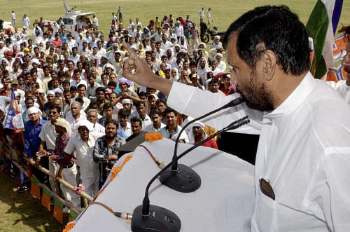 LJP chief Ram Vilas Paswan addresses an election meeting in the favour of BJP candidate Ram Kripal Yadav for Patliputra seat in Patna on Wednesday. PTI Photo