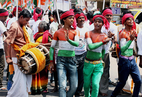 Supporters of Congress performing during an Election Campaign Rally in Coimbatore PTI image