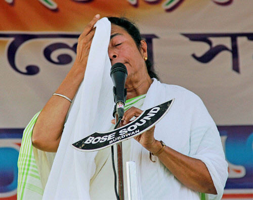 WB CM and TMC supremo Mamata Banerjee during an election campaign in Burdwan district in West Bengal on Monday. PTI Photo