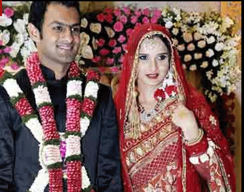Indian tennis star Sania Mirza has dismissed reports that her marriage with Pakistan cricketer Shoaib Malik is in trouble. PTI File Photo of the couple's wedding.