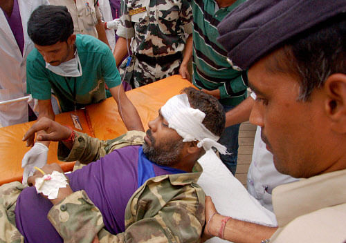 An injured CRPF jawan is shifted to a hospital in Raipur on Wednesday after a Naxal attack in Sukma. PTI Photo