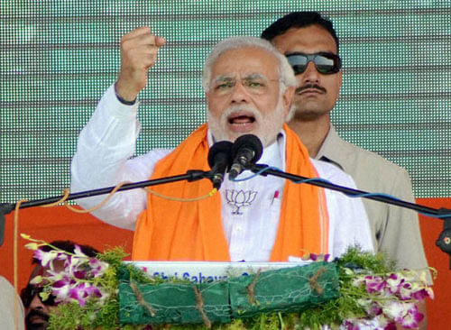 'When the government changed in Bengal, I thought there would be development. But nothing has happened. They are only indulging in votebank politics,' Modi told an election rally. PTI Photo