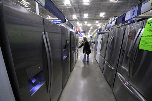 A high-tech refrigerator can keep track of the food stored in the same and adjust the temperature in relation to the humidity outside.  AP file photo