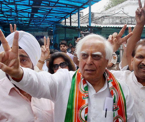 Senior Congress leader Kapil Sibal today moved the Election Commission over the issue of the marital status of Narendra Modi by seeking action by the poll body against the BJP leader for "hiding" facts in election affidavits filed by him in the past. PTI