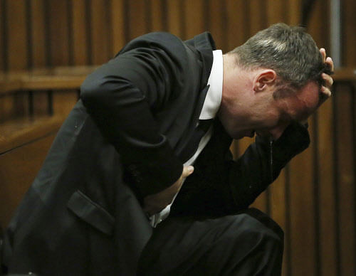 In an electric exchange in the Pretoria High Court, Gerrie Nel, one of South Africa's top attorneys, said it was beyond belief that 29-year-old law graduate and model Reeva Steenkamp would have remained silent in the tiny cubicle with an armed Pistorius shouting and screaming in the adjoining bathroom. Reuters file photo