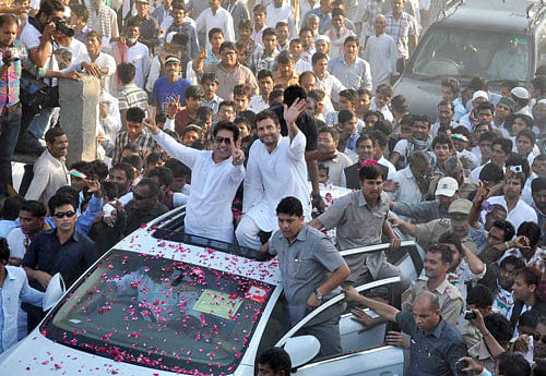 Congress Vice President Rahul Gandhi during road show in Rampur on Friday. PTI Photo