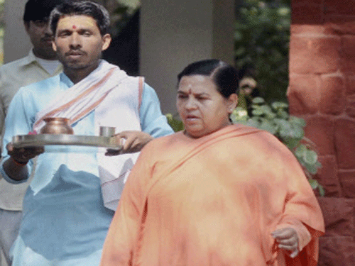 ''Son-in-law of Sonia Gandhi had been involved in several falsehood and after the election if BJP comes to power then you must be sure that he would be in jail,'' says Bharti. PTI file photo