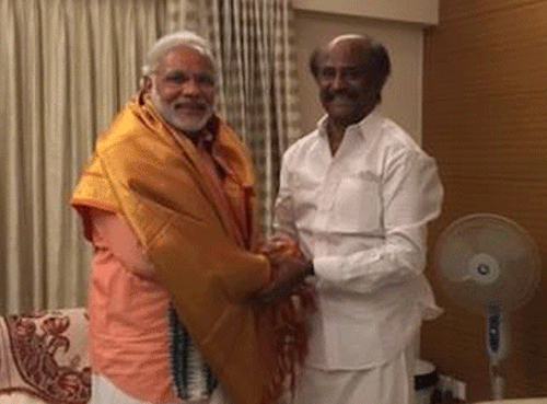 BJP's prime ministerial candidate Narendra Modi today called on Tamil 'Superstar' Rajinikant at his Poes Garden residence here. PTi photo