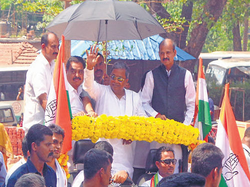 Chief Minister Siddaramaiah being taken in an open jeep procession in Sullia on Sunday. DHNS