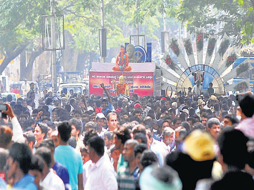 Hundreds of Dalits from Ashokpuram take out a procession as part of 123rd birth anniversary of Dr B R Ambedkar, in Mysore, on Monday. DH Photo