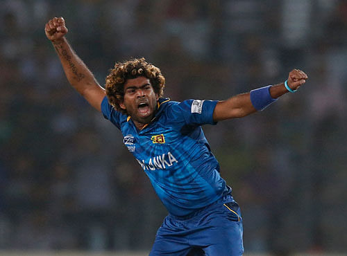 hot shots: Mumbai's Lasith Malinga is as miserly as they come while CSK's M S Dhoni can turn the heat on in an instant. AP file photo