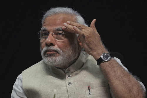 Narendra Modi sidesteps question of apologising for Guj riots. AP photo