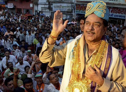 BJP Lok Sabha candidate from Patna Sahib seat Shatrughan Sinha gestures at an election campaign rally in Patna .  PTI Image