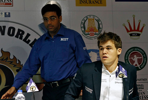 Vishwanathan Anand and Magnus Carlsen / Reuters Photo