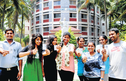 First time voters (from left) Chinnappa, Faiza, Priyanka, Ruby, Janani, Aquilla, Halima and Anil are excited about casting their vote. DH Photo