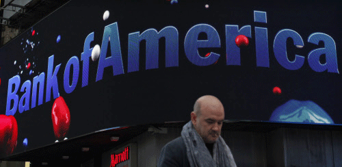 A man walks next to a Bank of America branch in New York. Reuters File photo