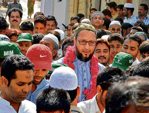 Tacit approach: President of All India Majlis E Ittehadul Muslimeen (MIM), Asaduddin Owaisi campaigns in Karwan assembly segment in Hyderabad. Photo by Mohammad Aleemuddin