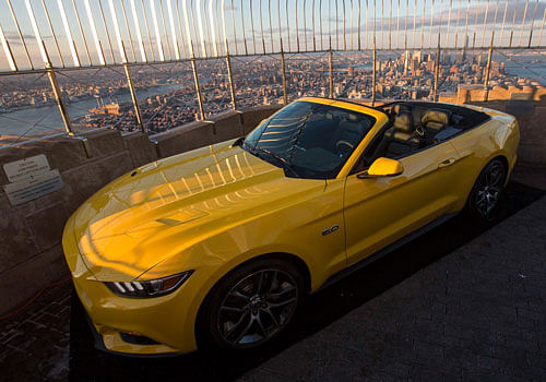 Ford celebrated the 50th birthday of its beloved Mustang by displaying a new model of the convertible on top of the Empire State Building in New York today. Reuters