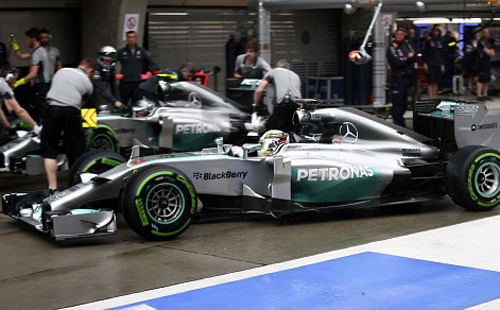 Lewis Hamilton convincingly snared pole position for the Chinese Grand Prix today as he put himself in line to win three races in a row for the first time and seize control of the championship. / AP Photo