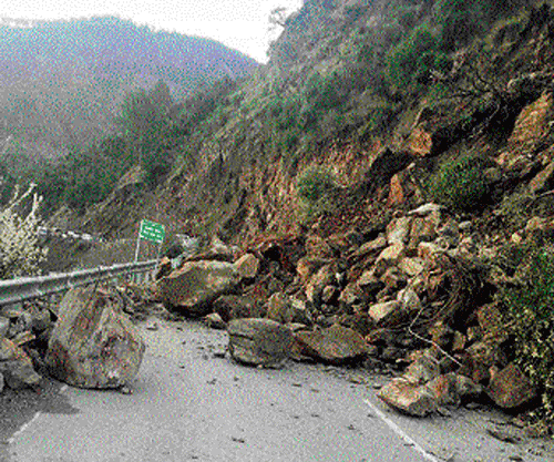 The Jammu-Srinagar National Highway at Doda blocked due to landslides and incessant rain in Jammu and Kashmir on Friday. PTI photo