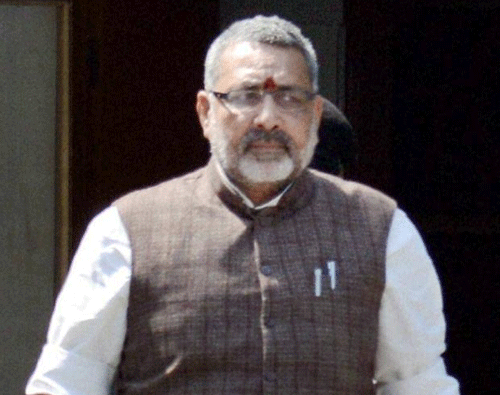 BJP today distanced itself from its Bihar leader Giriraj Singh's 'back Narendra Modi or go to Pakistan' remark with the party saying that he has been conveyed the ''displeasure'' of the top brass and asked to refrain from stoking any further row. PTI File Photo