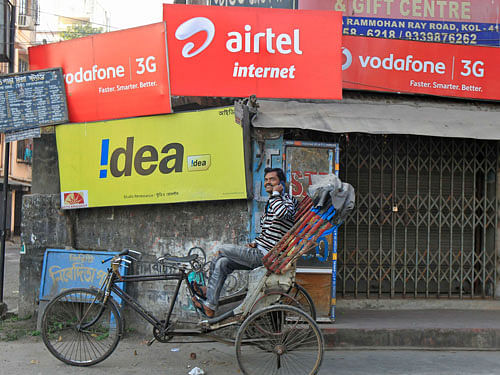 Old telecom operators are likely to get some relief in one-time spectrum charges, which is estimated at Rs 23,197 crore at present, as the DoT is re-calculating rates afresh based on February auction price. Reuters File Photo