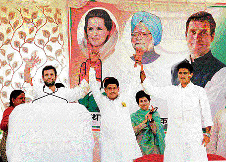 Lending a hand: Congress vice-president Rahul Gandhi with Rajasthan Congress Committee president Sachin Pilot and Karauli seat candidate Lakhiram Bairwa at an election rally in Karauli, Rajasthan, on Sunday. PTI