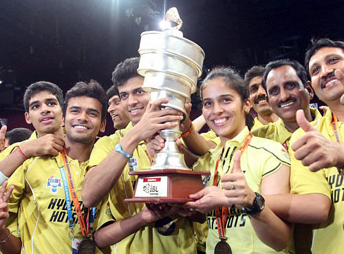 Hyderabad Hotshots players celebrate with the winning trophy of the first Indian Badminton League in Mumbai. A busy international calender has forced the Badminton Association of India (BAI) to postpone the second edition of the lucrative Indian Badminton League (IBL) that is scheduled for September-October. PTI