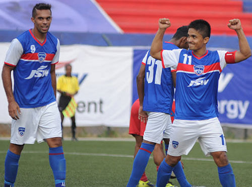 First-timers Bengaluru Football Club wrote a new chapter in Indian football by clinching the I-League title in their debut season courtesy a 4-2 away win over Dempo Sports Club here, with captain Sunil Chhetri fittingly netting the final goal. DH Photo