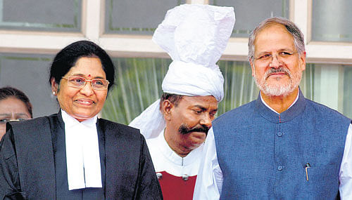 Newly sworn-in Chief Justice of the Delhi High Court Justice Gorla Rohini with Lieutenant Governor of Delhi Najeeb Jung (right) after taking oath in New Delhi on Monday. PTI
