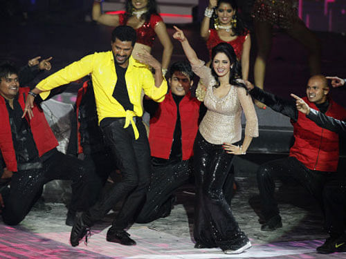 This July 6, 2013 file photo shows Bollywood actors Sridevi and Prabhu Deva performing during the International Indian Film Academy (IIFA) awards in Macau. The IIFA is holding its annual awards ceremony in Tampa this week. The city is an unusual choice for the awards extravaganza, but tourism officials hope it will be an economic boon to Tampa, which has hosted four Super Bowls and the Republican National Convention. AP Photo