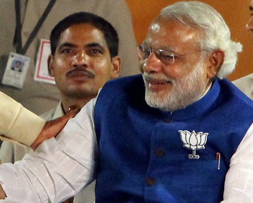BJP's prime ministerial candidate Narendra Modi will file his nomination papers from Varanasi Thursday and several hundred kg of rose petals and other flowers have been ordered, party leaders said Wednesday. / PTI Photo