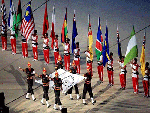 File photo of military personnel march with Commonwealth Games Federation flag at Jawaharlal Nehru Stadium during the opening ceremony of the Games in New Delhi. A whopping Rs. 678 crore were allocated for preparations before India hosted the the 2010 CWG in Delhi. PTI