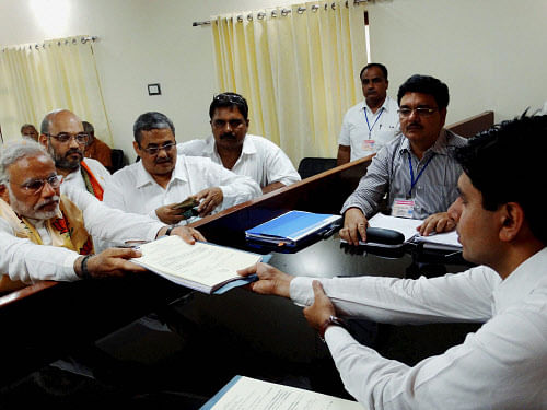 BJP Prime Ministerial candidate Narendra Modi filing his nomination papers in Varanasi on Thursday. PTI Photo