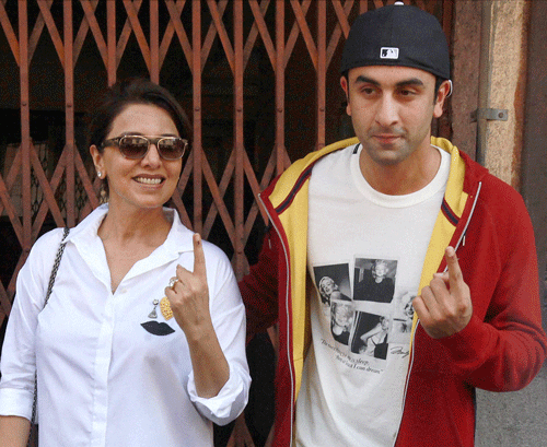Bollywood actor Ranbir Kapoor and his mother Nitu Singh display their inked fingers after casting votes for Lok Sabha polls in Mumbai on Thursday. PTI Photo