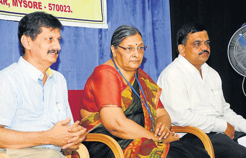 Principal of JSS Law College K S Suresh, Chief Scientist, CFTRI, Mysore, Lalitha R Gowda and Head of PG Law Department Nataraj during the lecture on food safety, at JSS Law College, in Mysore, on Thursday. DH Photo