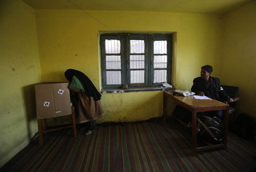 Fear was palpable on the faces of people in this south Kashmir district on the day of polling on Thursday with recent terror attacks on panchayat members and politicians vitiating the atmosphere. The poll boycott call by separatists added fuel to the fire. AP photo
