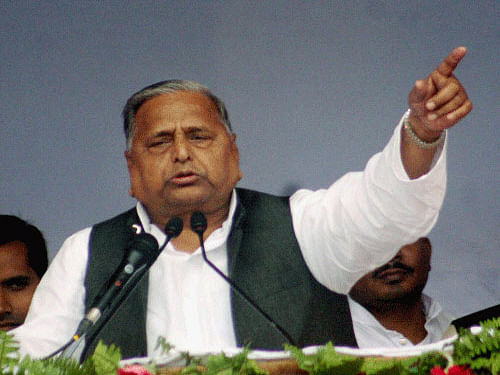 The Election Commission today let off Samajwadi Party chief Mulayam Singh Yadav with a 'warning' for threatening school teachers appointed on contract by Uttar Pradesh government to either vote for his party in Lok Sabha polls or risk losing permanent status. PTI file photo