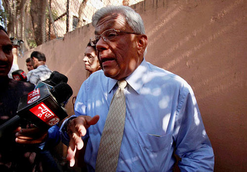 HDFC Chairman Deepak Parekh talks to the media outside a polling station in Mumbai on Thursday. Parekh reportedly could not vote as his name was not on the voters list. PTI Photo